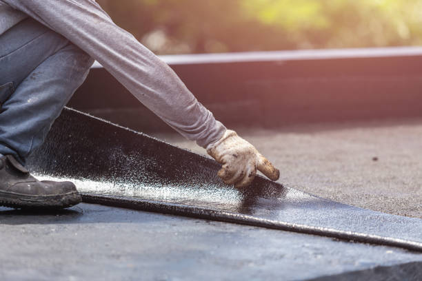 Professional Exterior Waterproofing technician working in Farmingdale, NY
